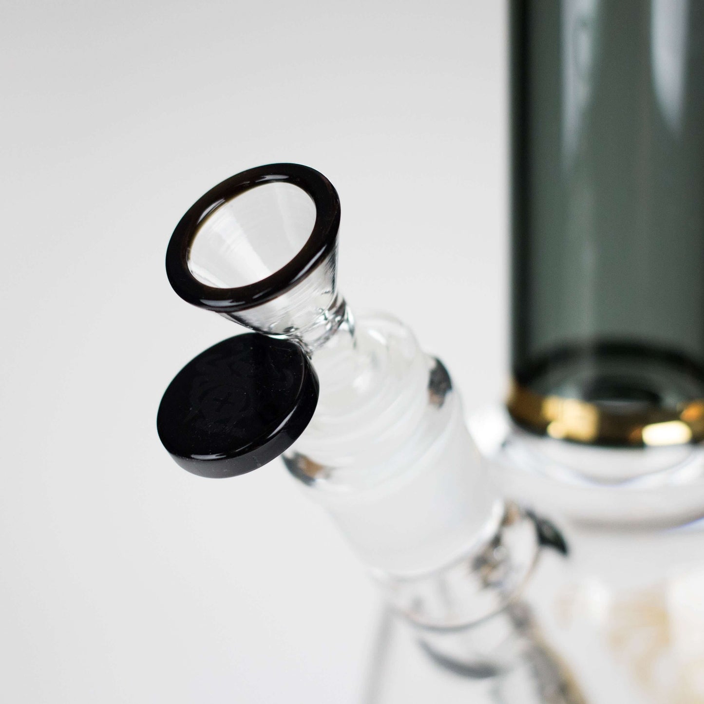 Close-up of the bowl and lip on the Xtreme 11" Color Tube Beaker Bong, showcasing its glass construction.
