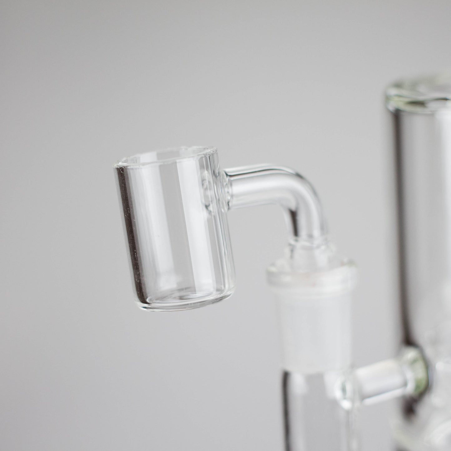 Close-up of the quartz banger on the 9" 2-in-1 Color accented Glass Dag Rig with Percolator.
