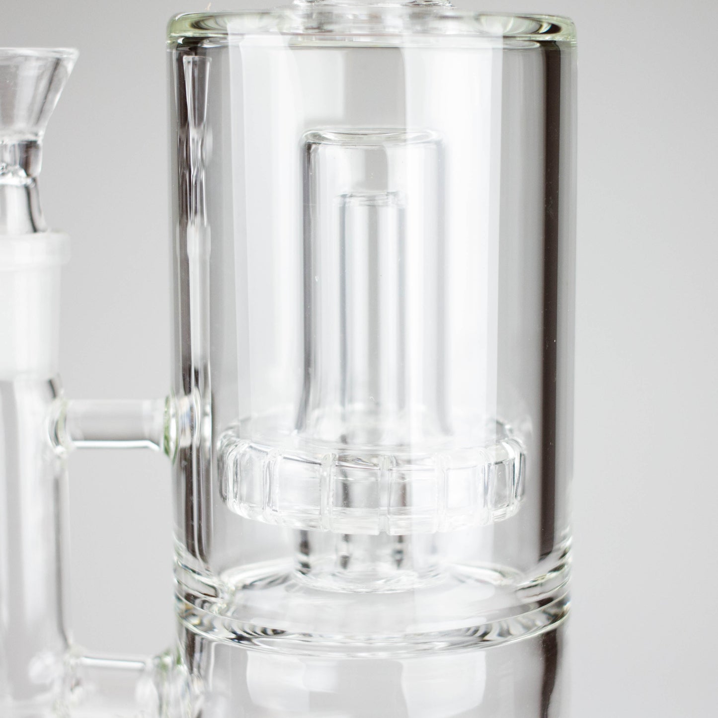 Close-up of 9" 2-in-1 Color accented Glass Dag Rig with Percolator showcasing the clear percolator design.